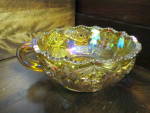 Click here to enlarge image and see more about item vcgag1d: Vintage Carnival Glass Amber Heritage Handled Nappy