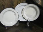 Click here to enlarge image and see more about item venwbw19g: Vintage Sweden White Enamel Ware Plate Set