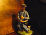 Click here to enlarge image and see more about item vpfigure7a: Vintage Brinn's Postman Figurine