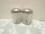 Click here to enlarge image and see more about item vplsp1l: Vintage Hard Plastic Ribbed Glass Salt & Pepper Shaker 