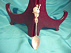 SILVER SPOON W/MAN PLAYING CELLO TOP HANDLE (Image1)