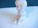 Click to view larger image of BISQUE WAVING KEWPIE SEATED (Image2)