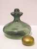 Click to view larger image of Vintage Green Bottle With Gold Colored Lid (Image2)