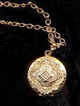 1928 Signed Goldtone Intricate Locket Necklace