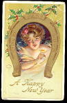 1908 'A Happy New Years' Girl in Horseshoe Postcard