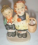 Old Boy and Girl Figurine Holding basket