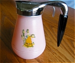 Click here to enlarge image and see more about item syrup70521: Bakelite Syrup Pitcher Vintage
