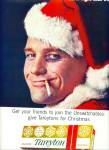 Click here to enlarge image and see more about item Z5897: 1963 Tareyton Cigarettes SANTA Man AD