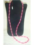 Click to view larger image of Long Pink Plastic Bead Necklace (Image1)