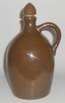 Click here to enlarge image and see more about item 10670: Fulper Pottery Brown Metallic Jug w/Cap