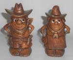 Click to view larger image of Treasure Craft Pottery Cowboy / Cowgirl Salt & Pepper  (Image1)