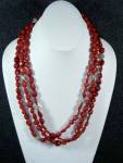 Click here to enlarge image and see more about item 0125201602:  Red Coral, Rhinestone 3 strand Necklace