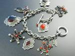 Click to view larger image of LEO FEENEY Coral Garnet Sterling Silver Charm Bracelet  (Image1)