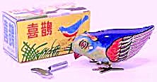 Vintage Wind Up Hopping Tin Toy