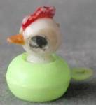 Click here to enlarge image and see more about item C21: Vintage Plastic Bobble Chick Charm