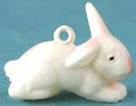 Click here to enlarge image and see more about item CAN40: Vintage Celluloid Bunny Charm