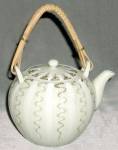 Click to view larger image of Vintage Small Woven Handled Teapot (Image1)