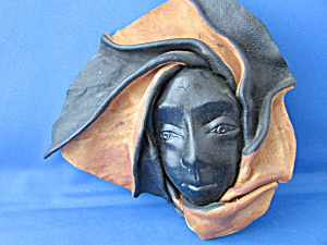 Leather Art Of A Face