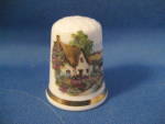 Click to view larger image of Thimble English Thatched Cottage Bone China (Image1)