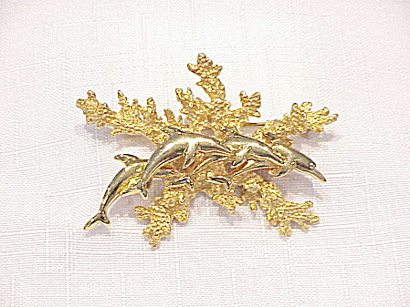 Dolphins Swimming Over Coral Gold Tone Brooch
