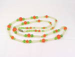 VINTAGE ART DECO OR FLAPPER ORANGE, GREEN, FROSTED GLASS BEAD NECKLACE