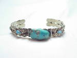 NATIVE AMERICAN STERLING SILVER AND TURQUOISE CUFF BRACELET