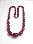 Click to view larger image of VINTAGE CHERRY AMBER BAKELITE FATURAN BEAD NECKLACE  (Image1)