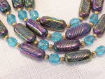 Click to view larger image of VINTAGE IRIDESCENT PURPLE BLUE CARNIVAL OR PEACOCK GLASS BEAD NECKLACE (Image3)