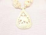 Click to view larger image of VINTAGE CARVED FAUX IVORY OR HORN ELEPHANT NECKLACE (Image2)