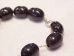 Click to view larger image of ANTIQUE CHERRY AMBER BEADS ON STERLING SILVER CHAIN LINK BRACELET    (Image5)